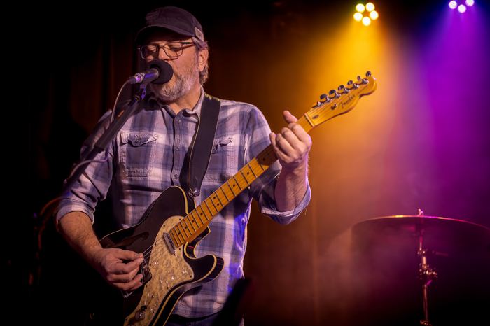 Ryan Elliott plays guitar.