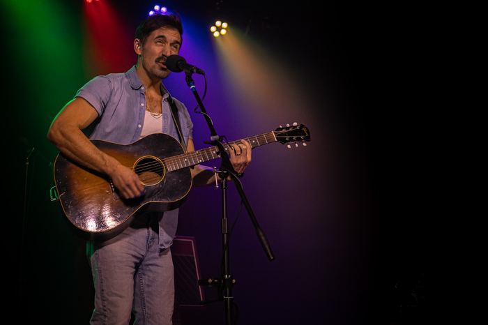Zach Pietrini plays songs to open the night.