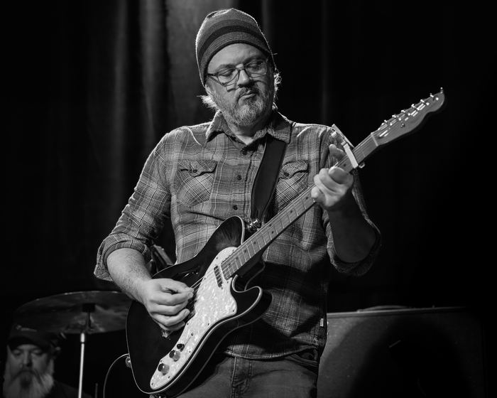 Ryan Elliott plays guitar.