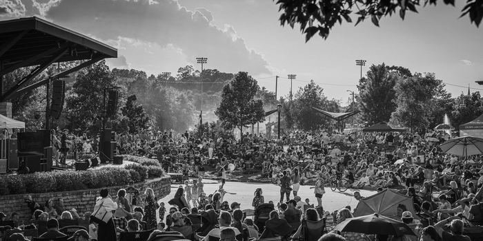 The Hart Park lawn fills in as the sun drops during Bockenplautz's set.