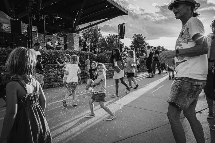 Bubbles drift through the crowd as the Studs play on.
