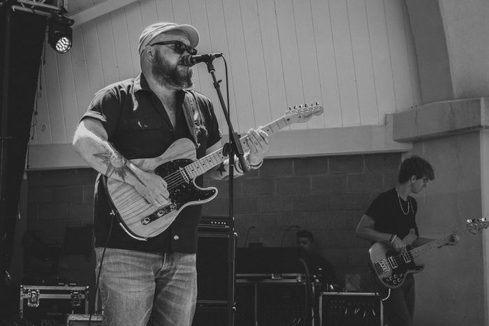 Frontman, Ricky Ganiere, at the mic