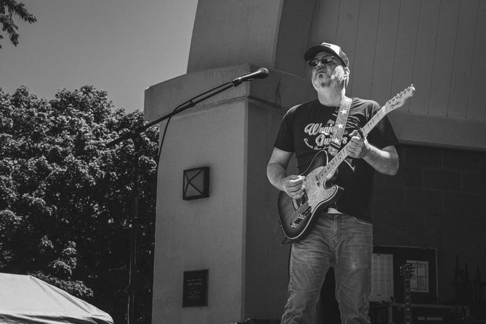 Ryan Elliott looks over the crowd as he plays a solo